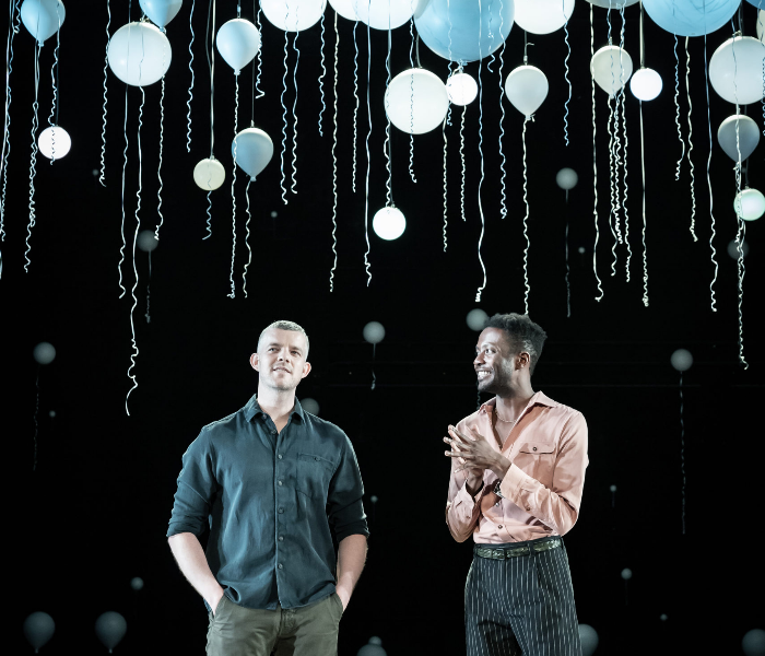 Russell Tovey and Omari Douglas in Constellations, which is streaming through National Theatre at Home. Photo by Marc Brenner.