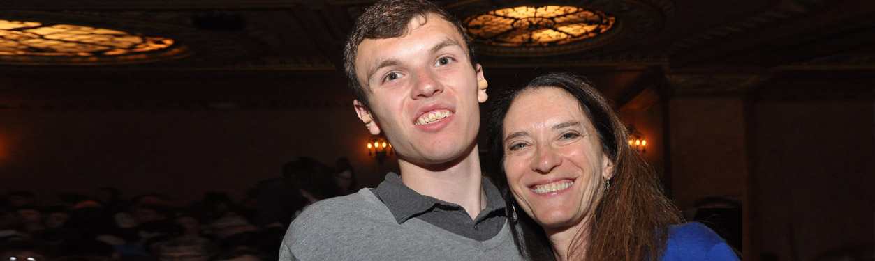 A mother and son attend an autism friendly performance