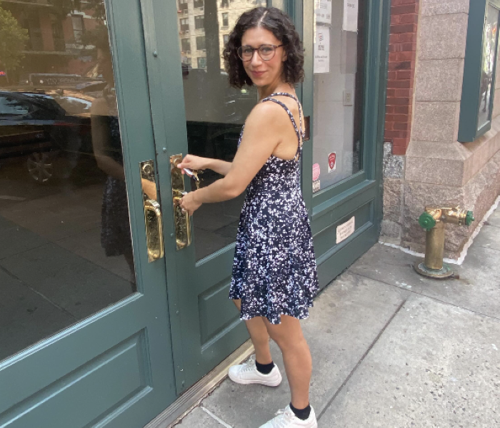 Out of the Box Theatrics Founding Artistic Director Liz Flemming opens the doors of 154. Photo by Gabrielle Garcia.