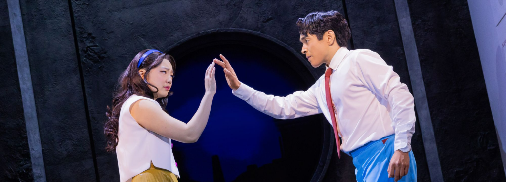 A woman and a man touching hands