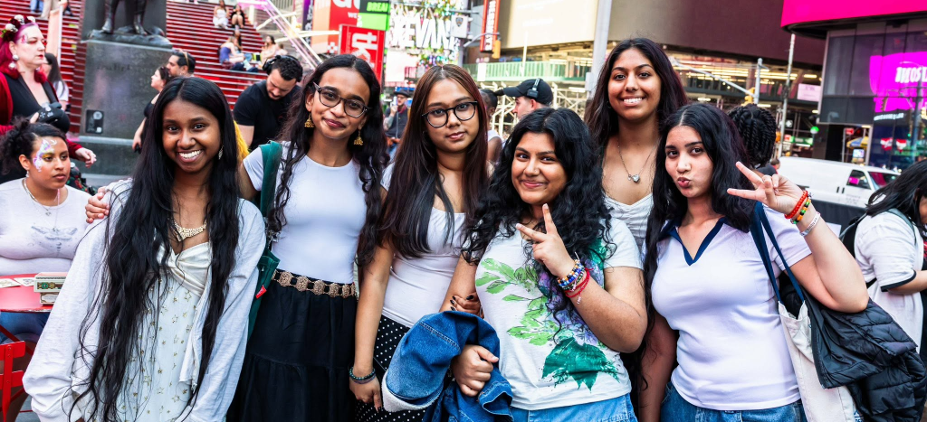 A group of students posing and smiling